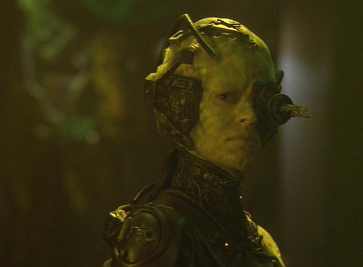 Still frame from Star Trek: Voyager showing Seven of Nine while she was still a Borg drone.
