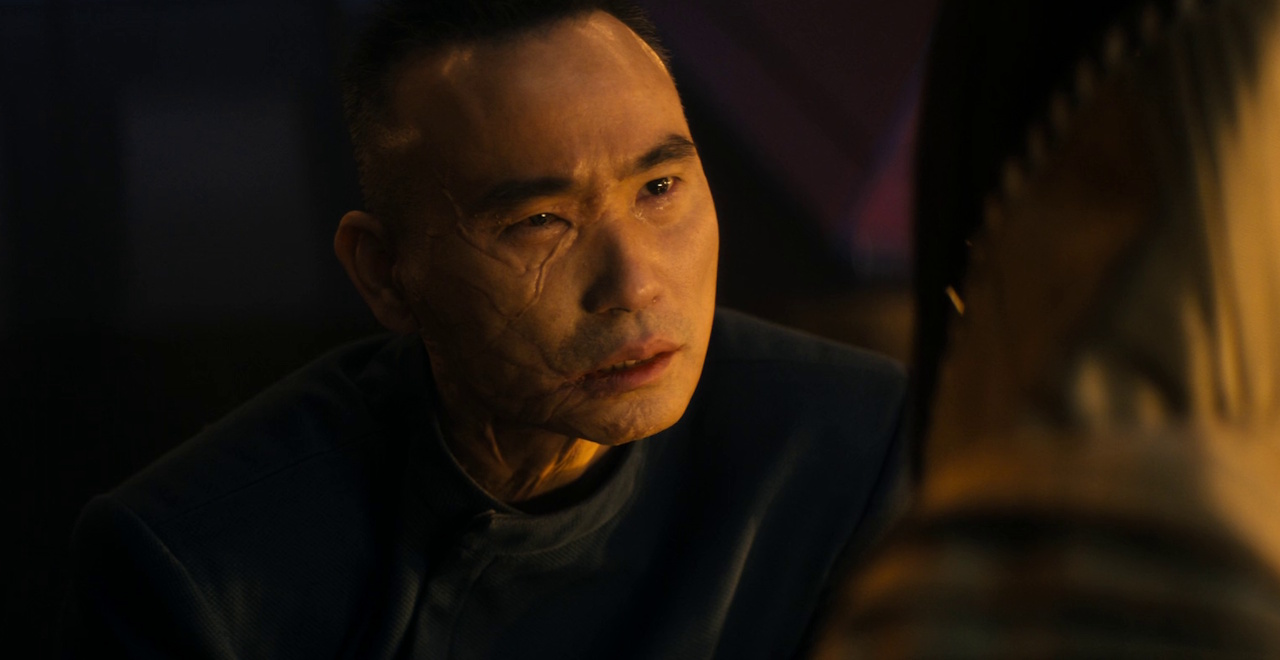 Still frame from Star Trek: Section 31 (2025) showing a close-up of San.