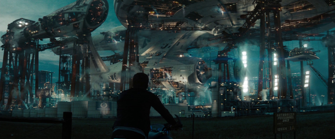 Still frame from Star Trek (2009) showing Kirk watching the USS Enterprise being built.