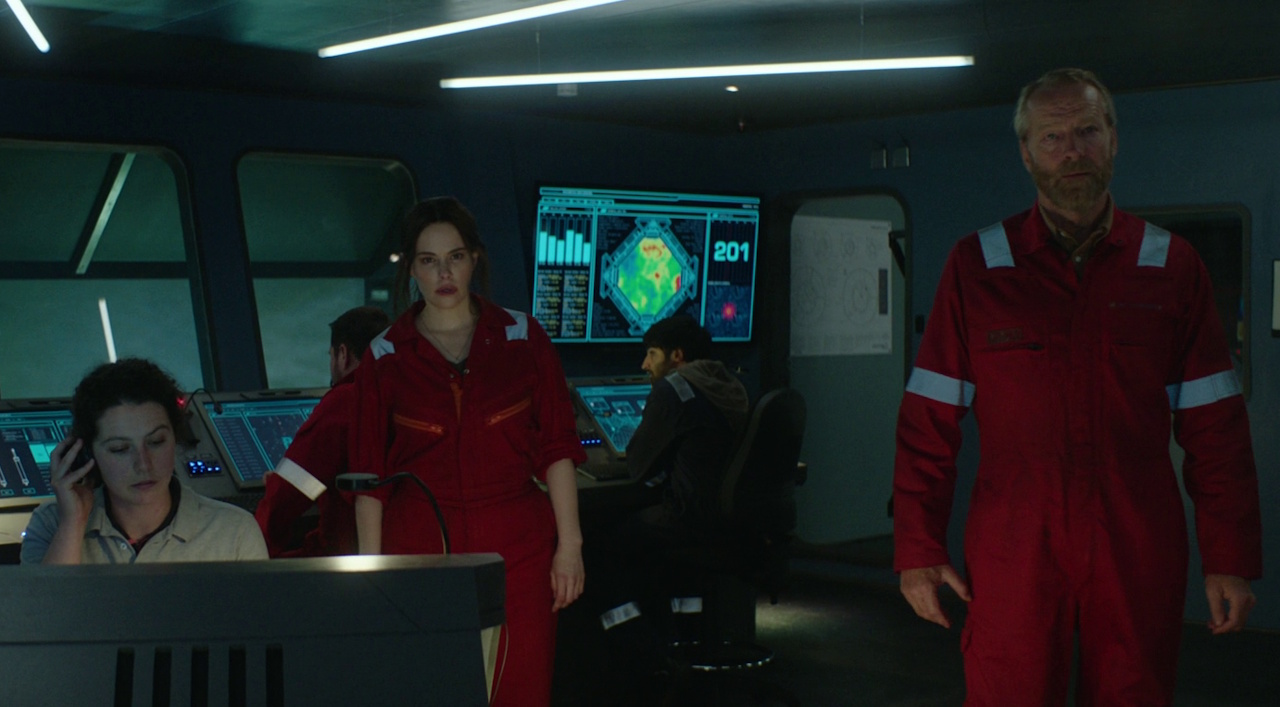 Still frame from The Rig Season 2 (2025) showing Heather, Rose, Magnus, and other characters in the Gallery.