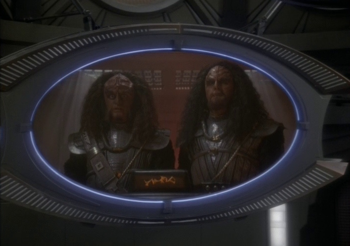 Still frame from Star Trek: Deep Space Nine showing two Klingon leaders on DS9's viewscreen.