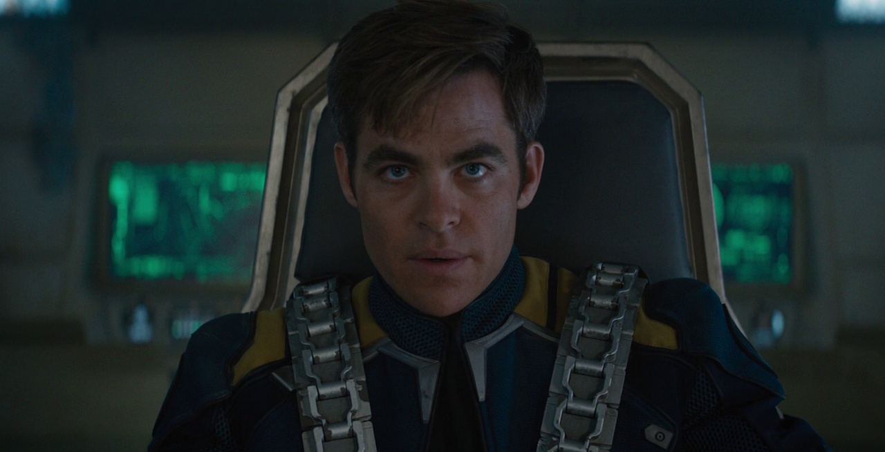 Still frame from Star Trek Beyond showing Kirk with a seatbelt on.