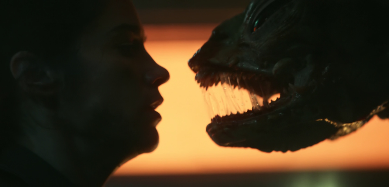 Still frame from Star Trek: Strange New Worlds Season 2 episode Hegemony showing Captain Batel and a Gorn.