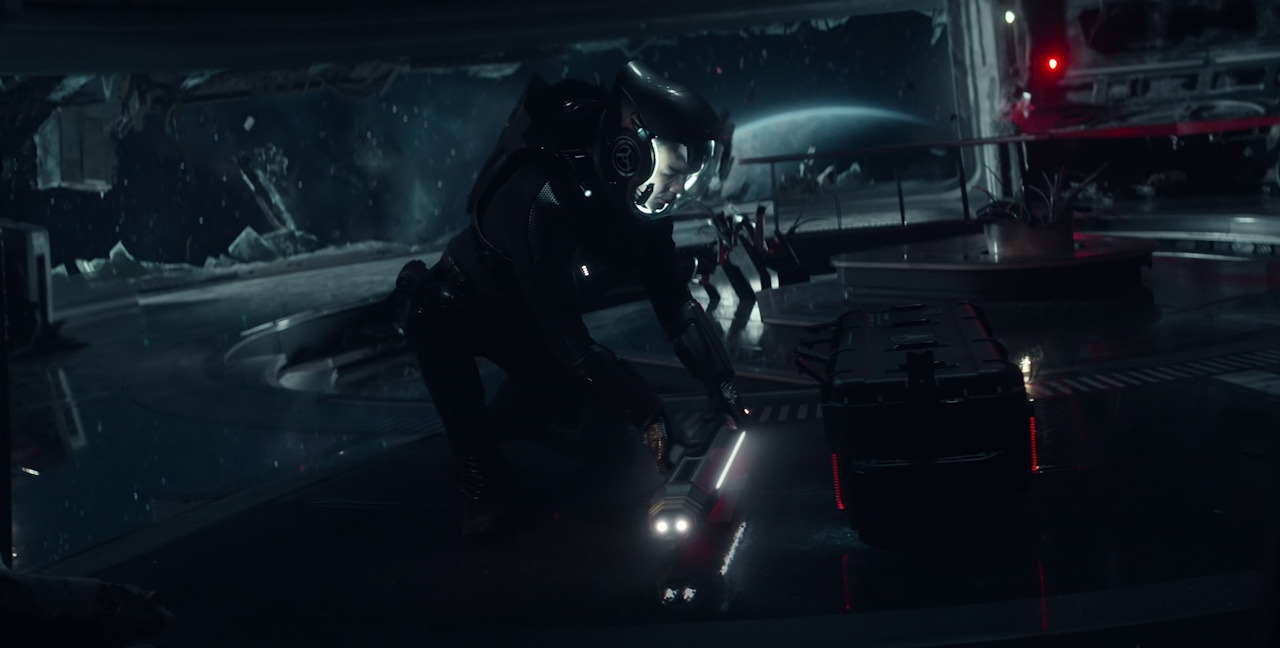 Still frame from Star Trek: Strange New Worlds Season 2 Episode 10 (2023) showing Spock on the wreck of the Cayuga, activating a rocket.