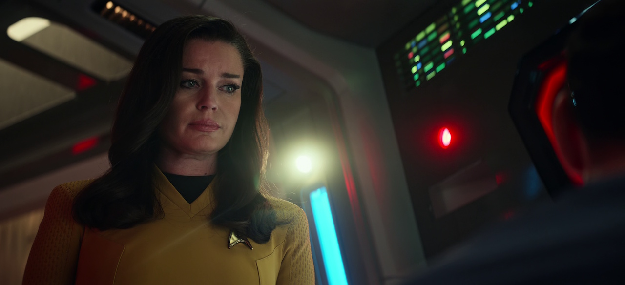 Still frame from Star Trek: Strange New Worlds Season 2 Episode 10 (2023) showing Una looking at Spock.