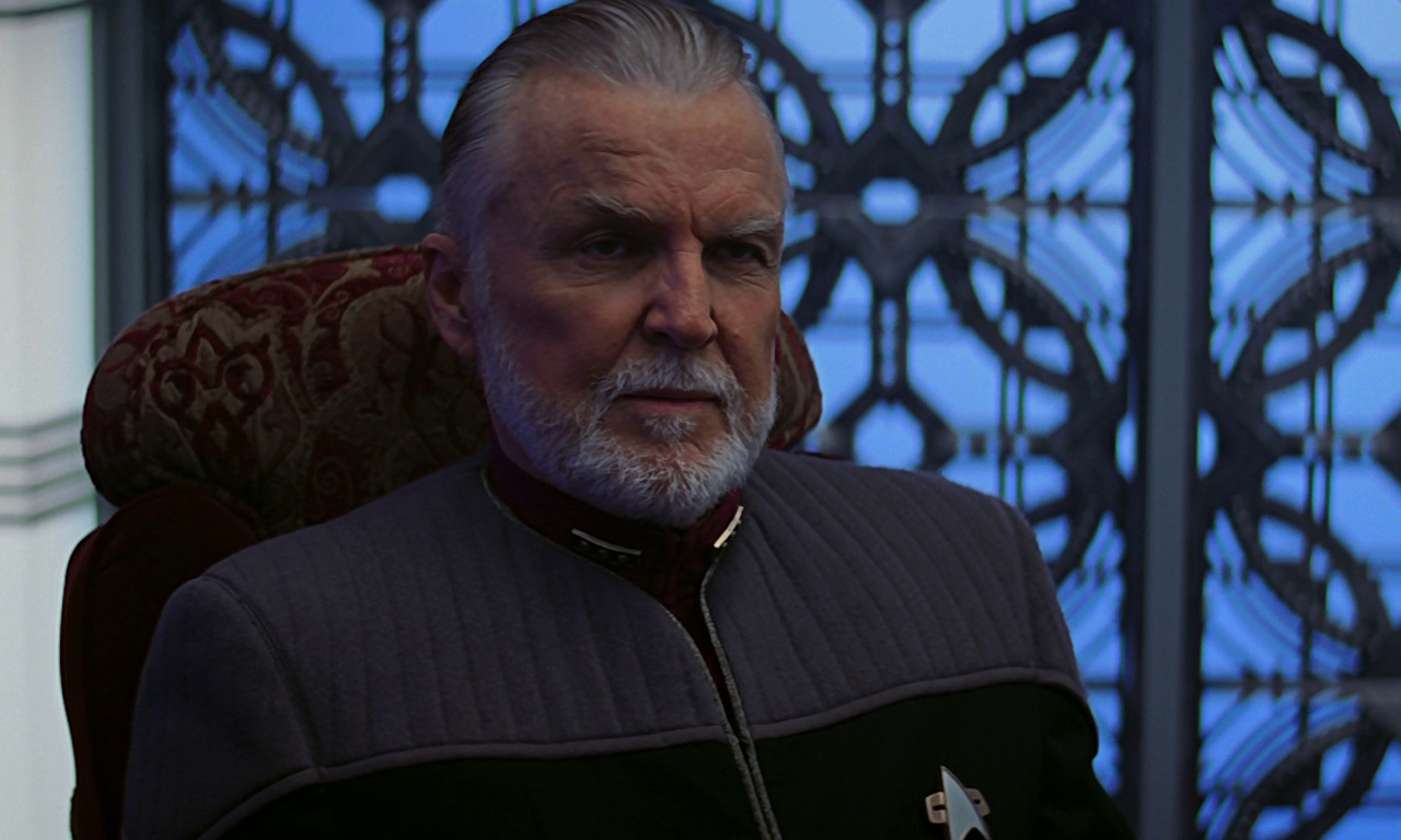 Still frame from Star Trek: Insurrection showing a close-up of Admiral Dougherty.