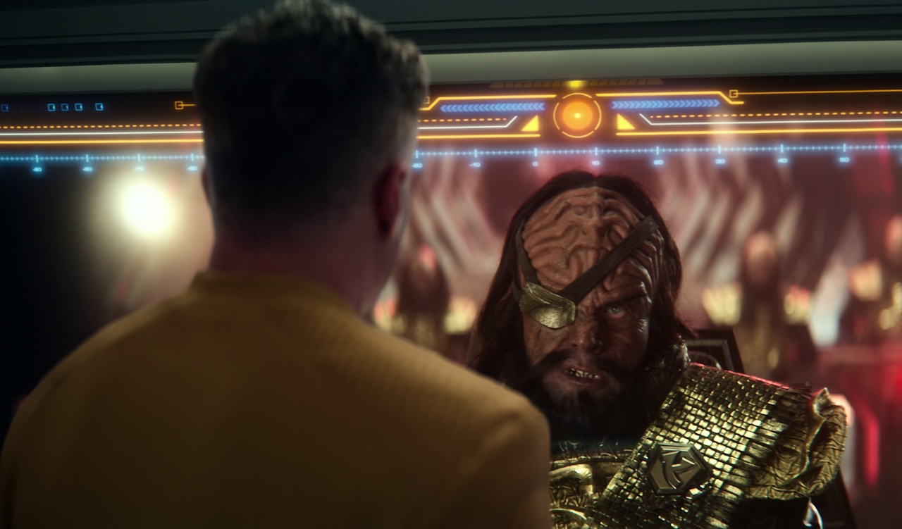 Still frame from Star Trek: Strange New Worlds Season 2 (2023) showing Captain Pike communicating with the Klingons.