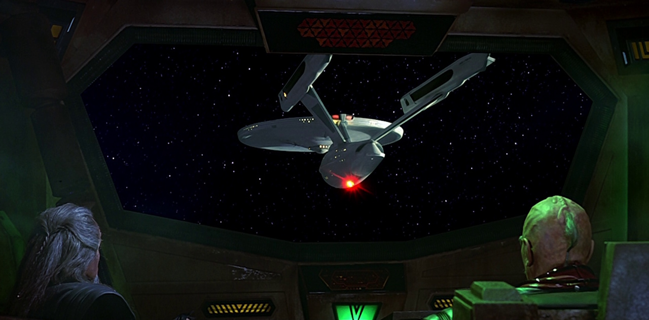 Still frame from The Undiscovered Country showing General Chang looking at the Enterprise.