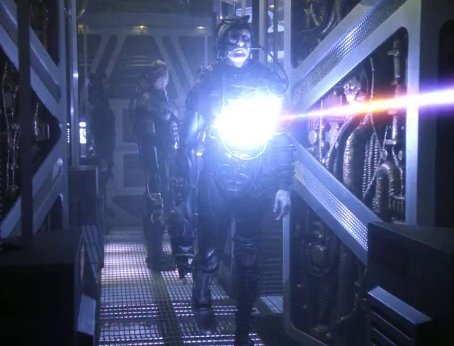 Still frame from Star Trek: The Next Generation showing a Borg drone being phasered.