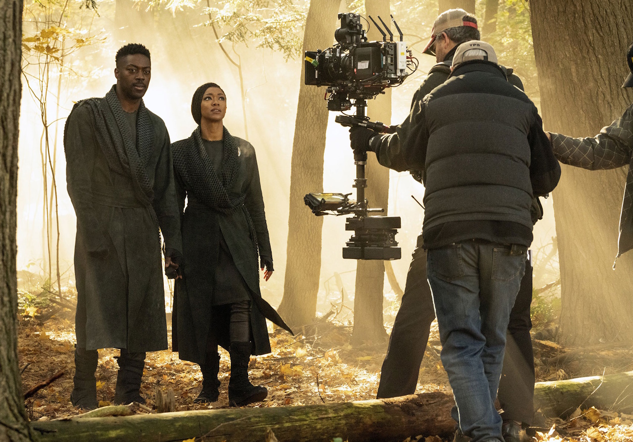 Behind-the-scenes photo from Star Trek: Discovery's third season showing Book and Burnham.