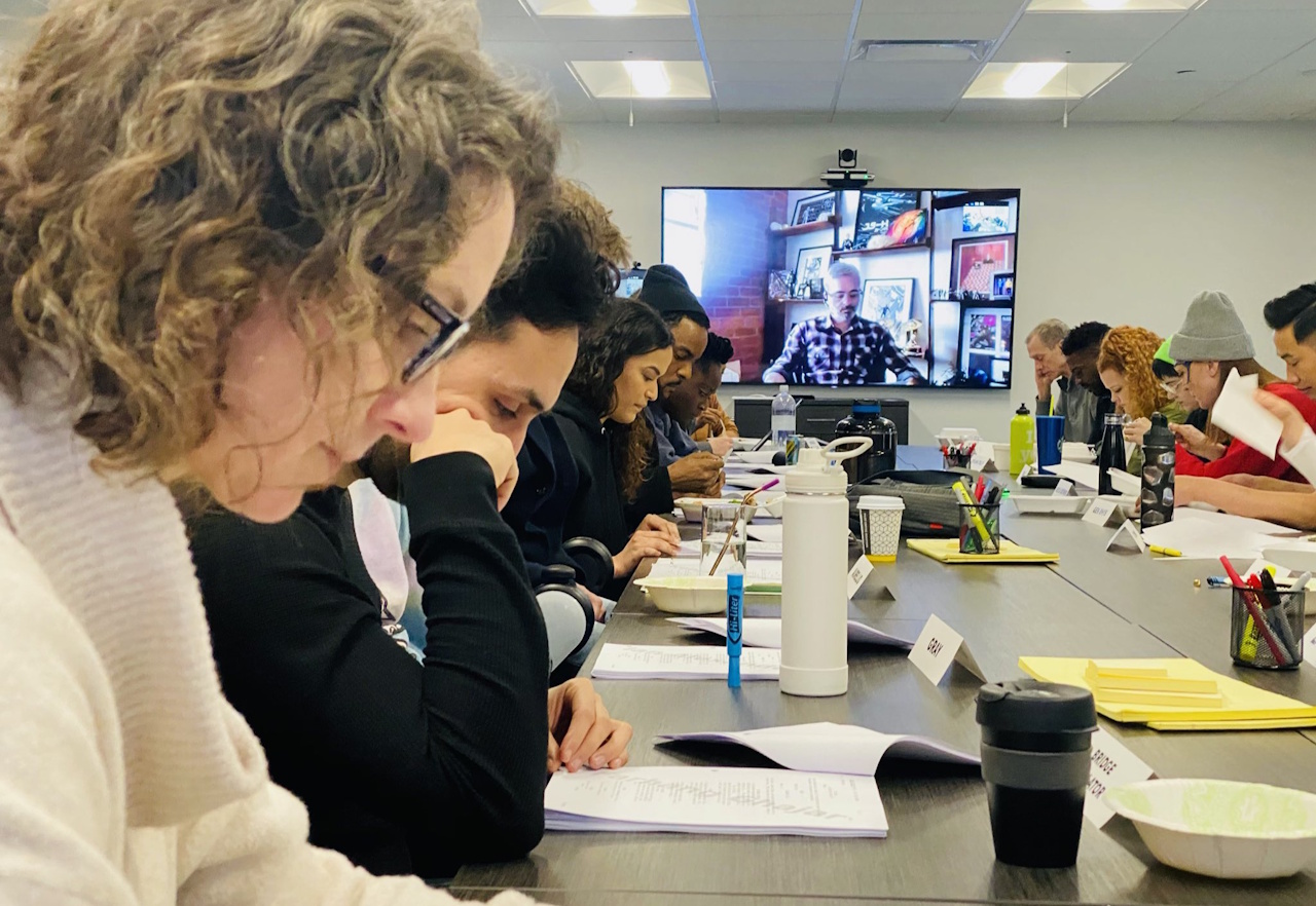 Behind-the-scenes photo of the cast and crew of Star Trek: Discovery Season 3 at a table read.