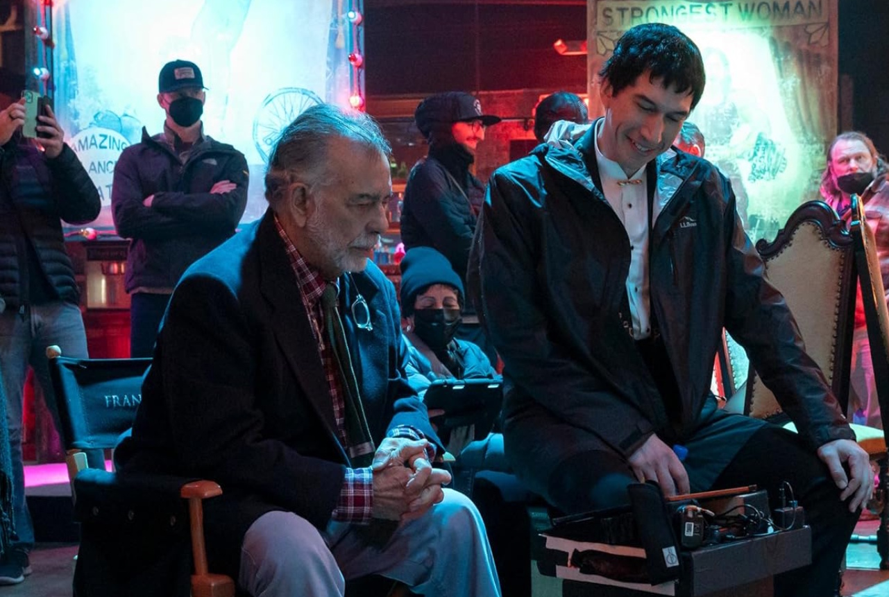 Behind-the-scenes photo from the set of Megalopolis (2024) showing director Francis Ford Coppola and actor Adam Driver.