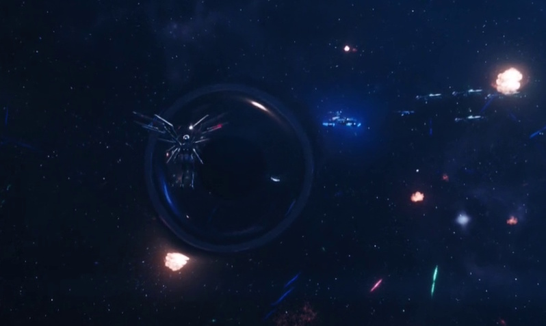 Still frame from Star Trek: Discovery Season 2 showing the Red Angel suit opening a portal.