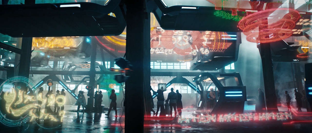 Still frame from Star Trek: Discovery Season 3 showing an alien marketplace.