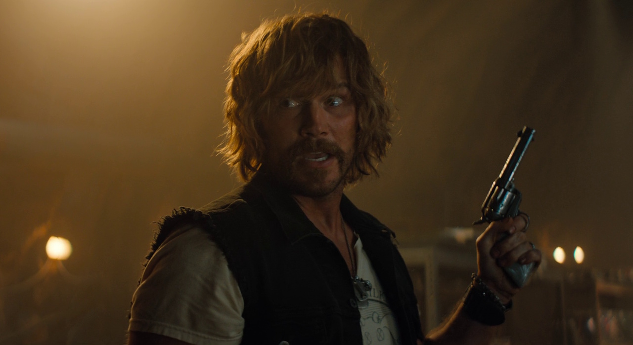 Still frame from The Electric State (2025) showing Chris Pratt's character, Keats.