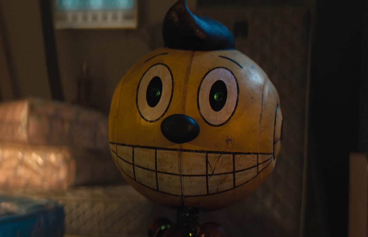 Still frame from The Electric State (2025) showing Cosmo/Chris.