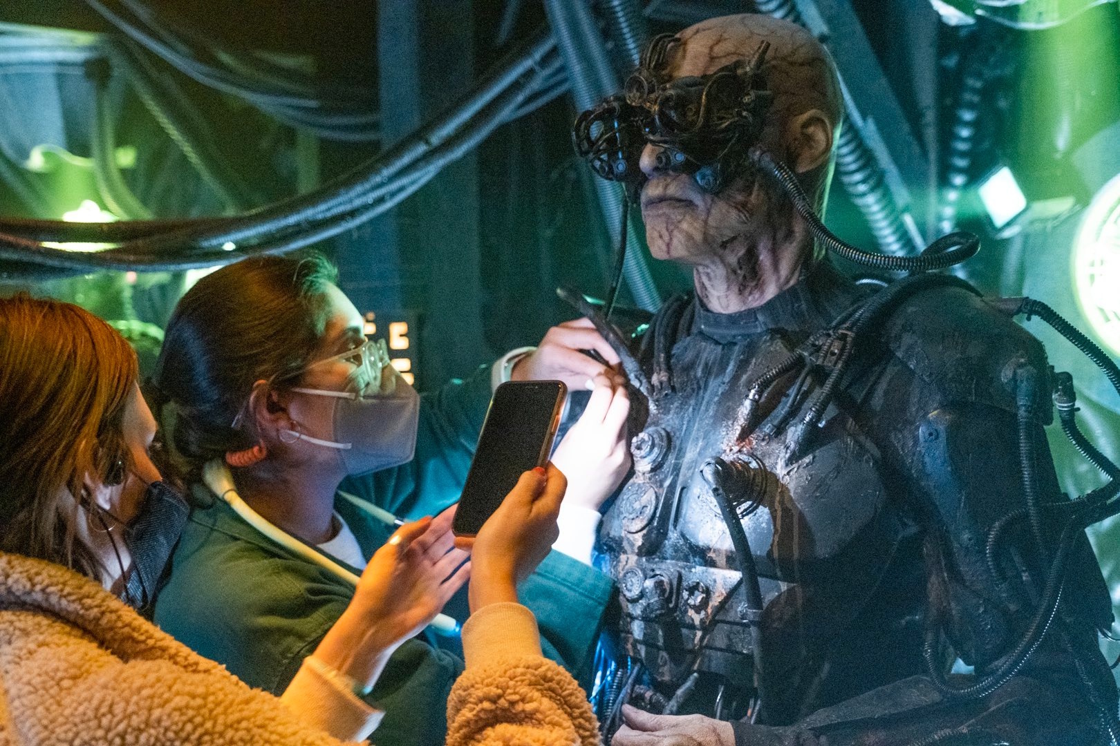 Behind-the-scenes photo from the set of Star Trek: Picard Season 3 showing a Borg character and two makeup artists.