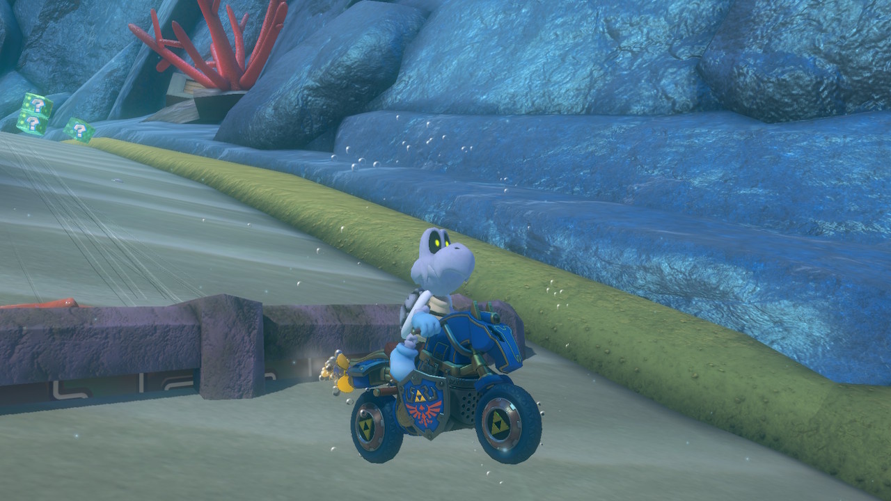 Screenshot of Mario Kart 8 Deluxe + Booster Course Pass showing Dry Bones racing on Piranha Plant Cove. 