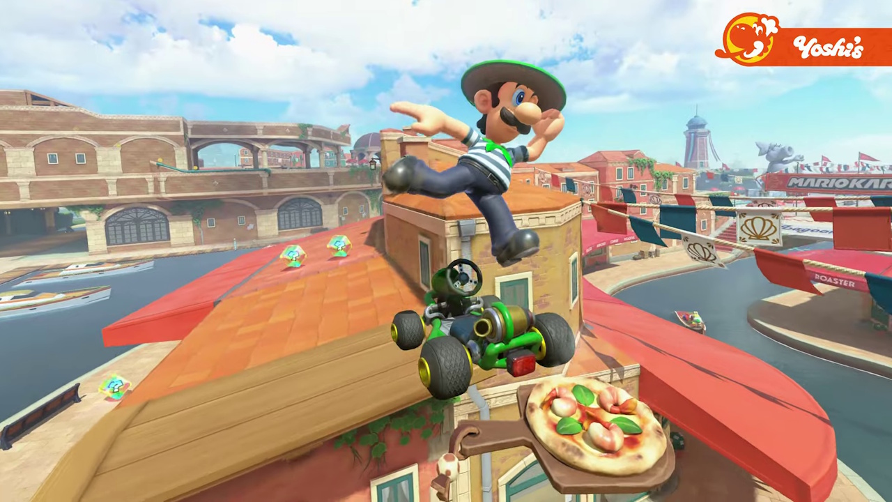 Still frame from the Mario Kart World Nintendo Direct broadcast showing Luigi with a pizza.