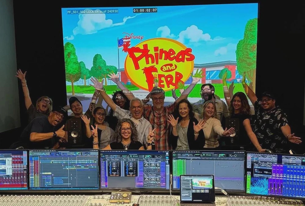 Behind-the-scenes photo from Phineas and Ferb Season 5 showing the production team.