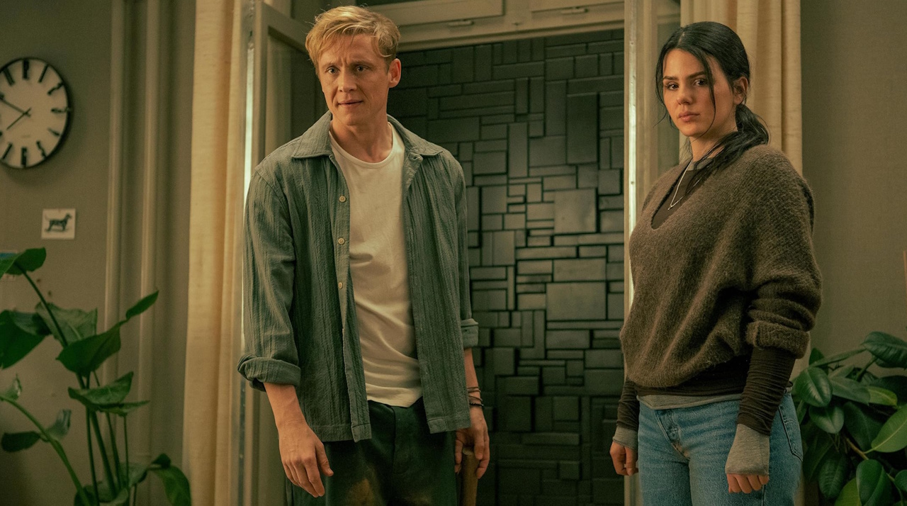 Promo still for Brick showing two characters and the titular bricks.