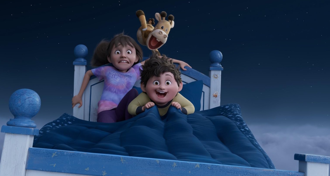 Promo still for In Your Dreams showing two characters (and a teddy) riding on a bed through the clouds.