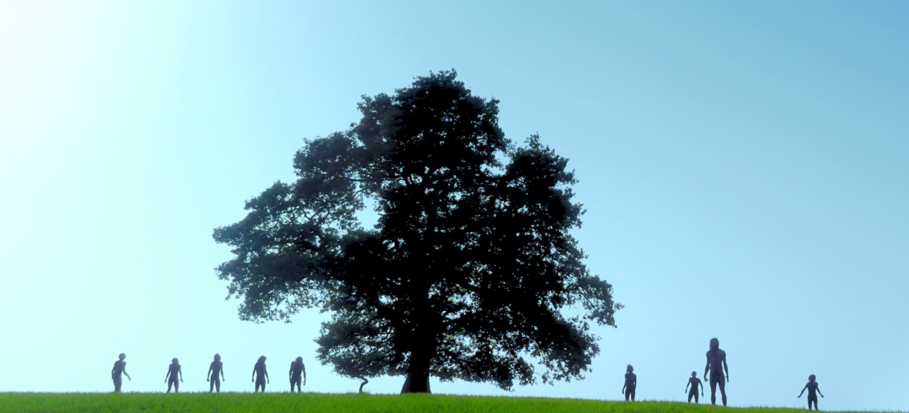 Still frame from 28 Years Later (2025) showing the infected on a hill beside a tree.