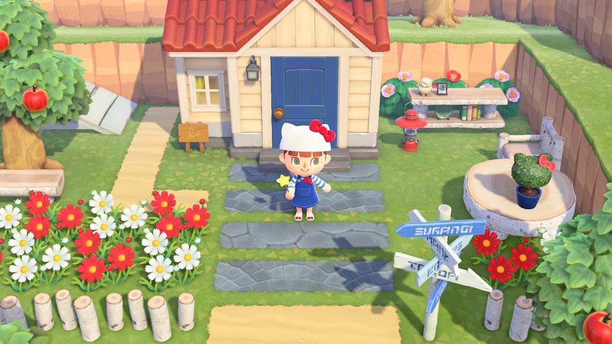 Promo screenshot for Animal Crossing: New Horizons showing a player character standing outside a house with decorative items and fencing.