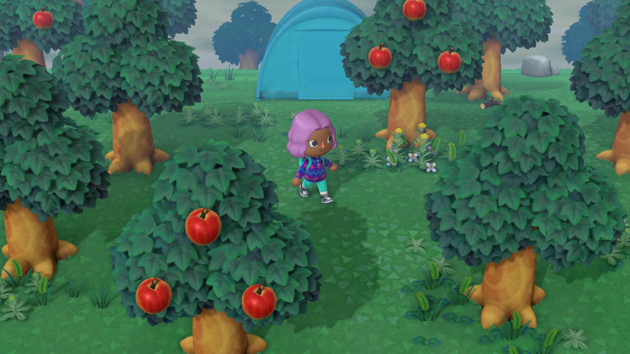 Promo screenshot for Animal Crossing: New Horizons showing a villager walking through fruit trees, with a tent in the background.