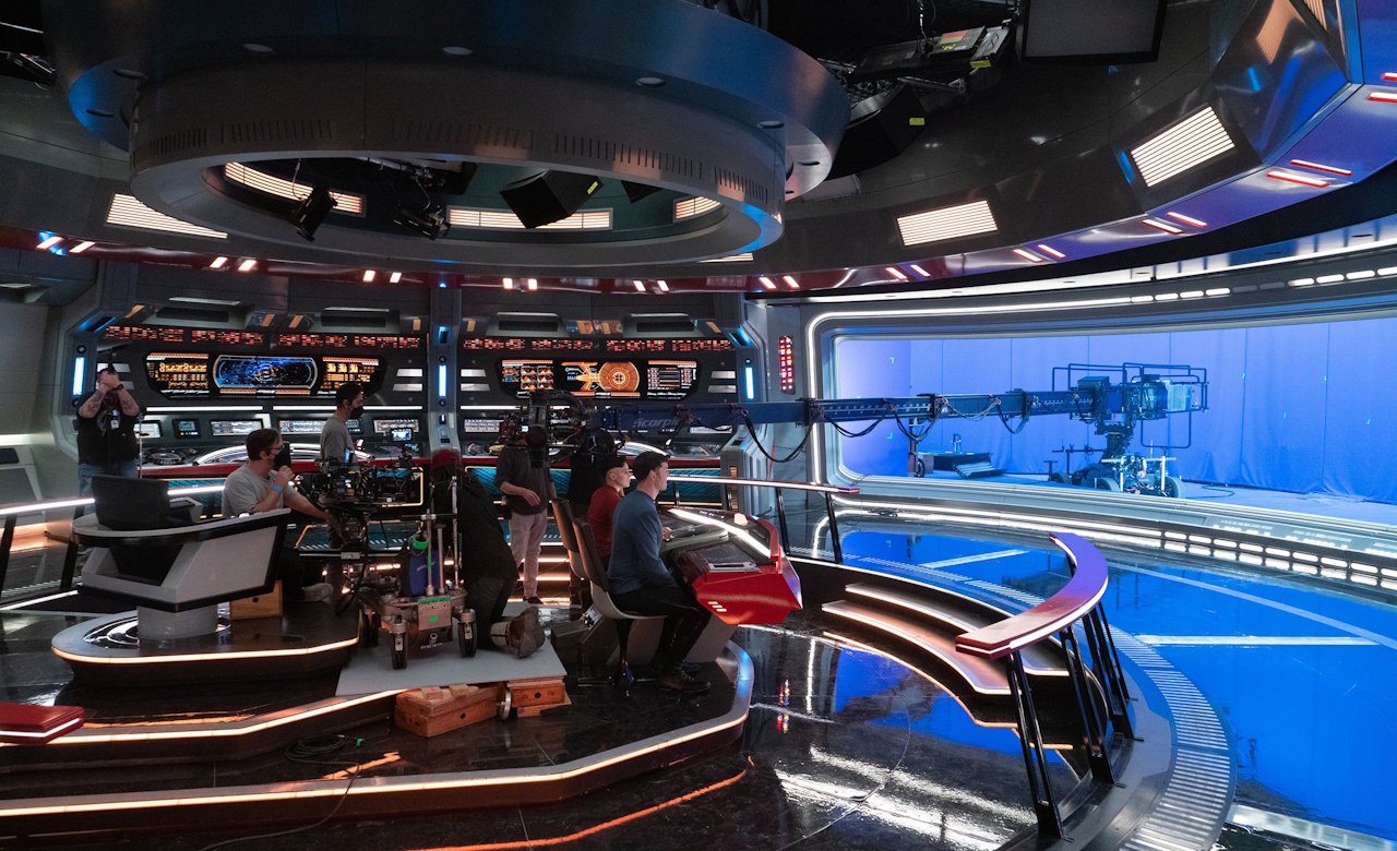 Behind-the-scenes photo from the set of Star Trek: Strange New Worlds Season 2 showing a scene being filmed on the bridge.