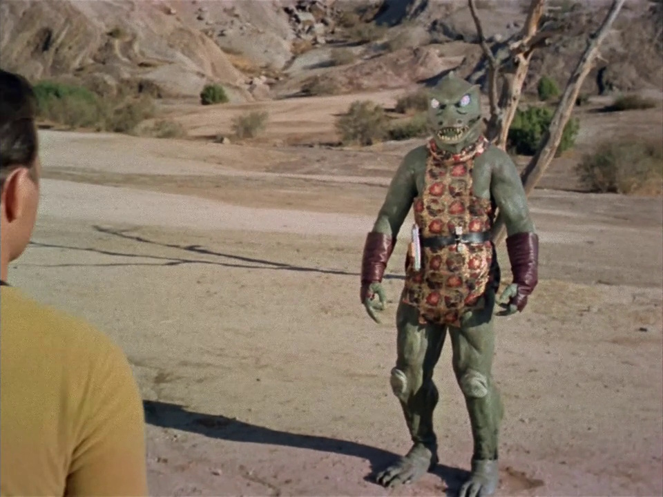 Still frame from Star Trek: The Original Series Season 1 episode Arena, showing Kirk and the Gorn captain's first encounter.