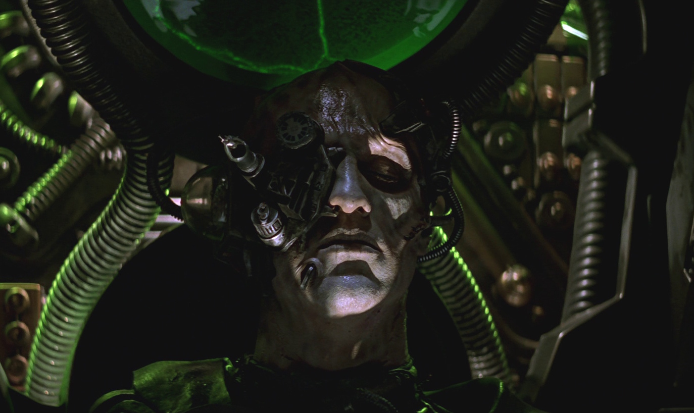 Still frame from Star Trek: First Contact showing a Borg drone in their alcove.
