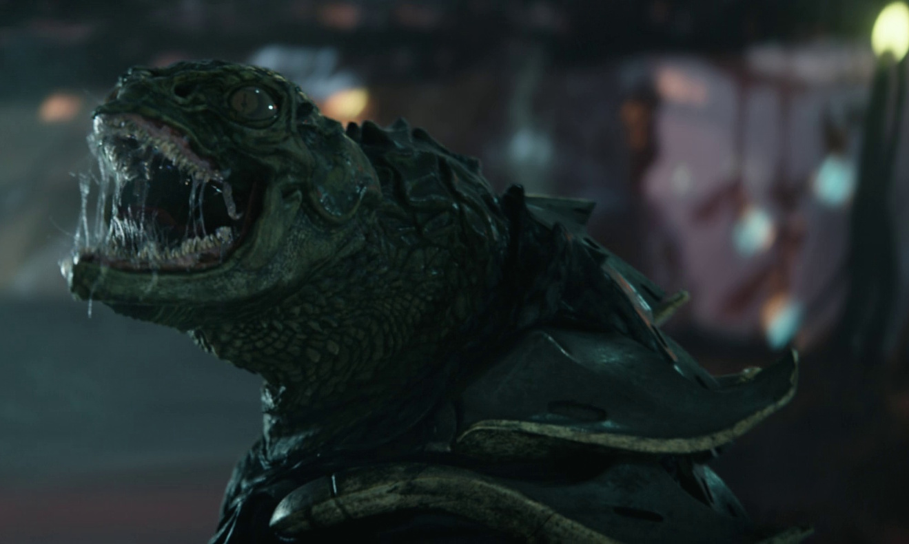 Still frame from Star Trek: Strange New Worlds 3x01: Hegemony, Part II, showing a Gorn roaring.