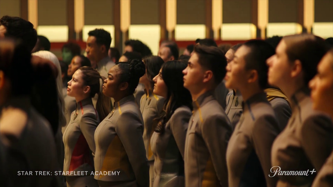 Still frame from the Star Trek: Starfleet Academy trailer showing a large group of cadets listening to a speech.