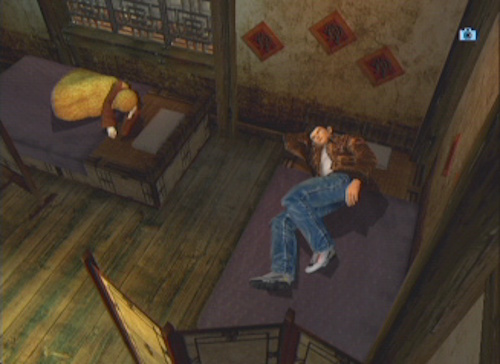 Screenshot of an unreleased Shenmue II scene showing Ryo and Shenhua in bed.