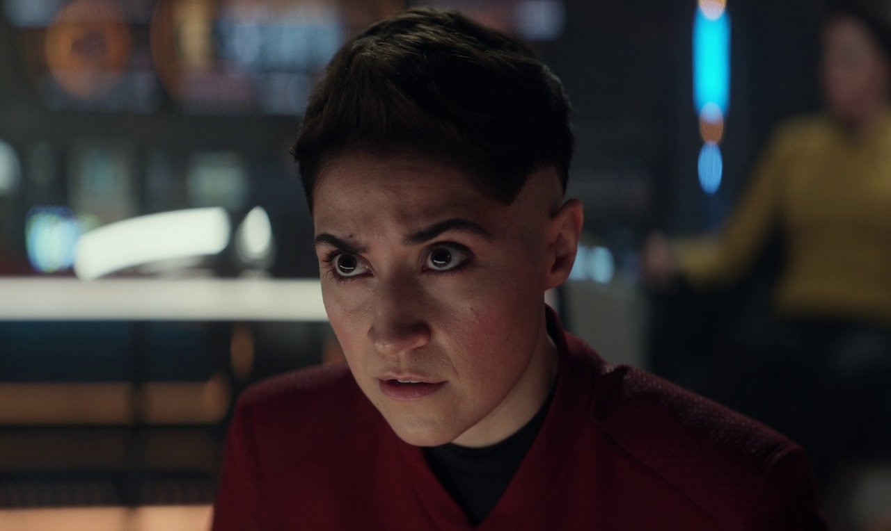 Still frame from Star Trek: Strange New Worlds 3x03: Shuttle to Kenfori, showing Ortegas at her post.