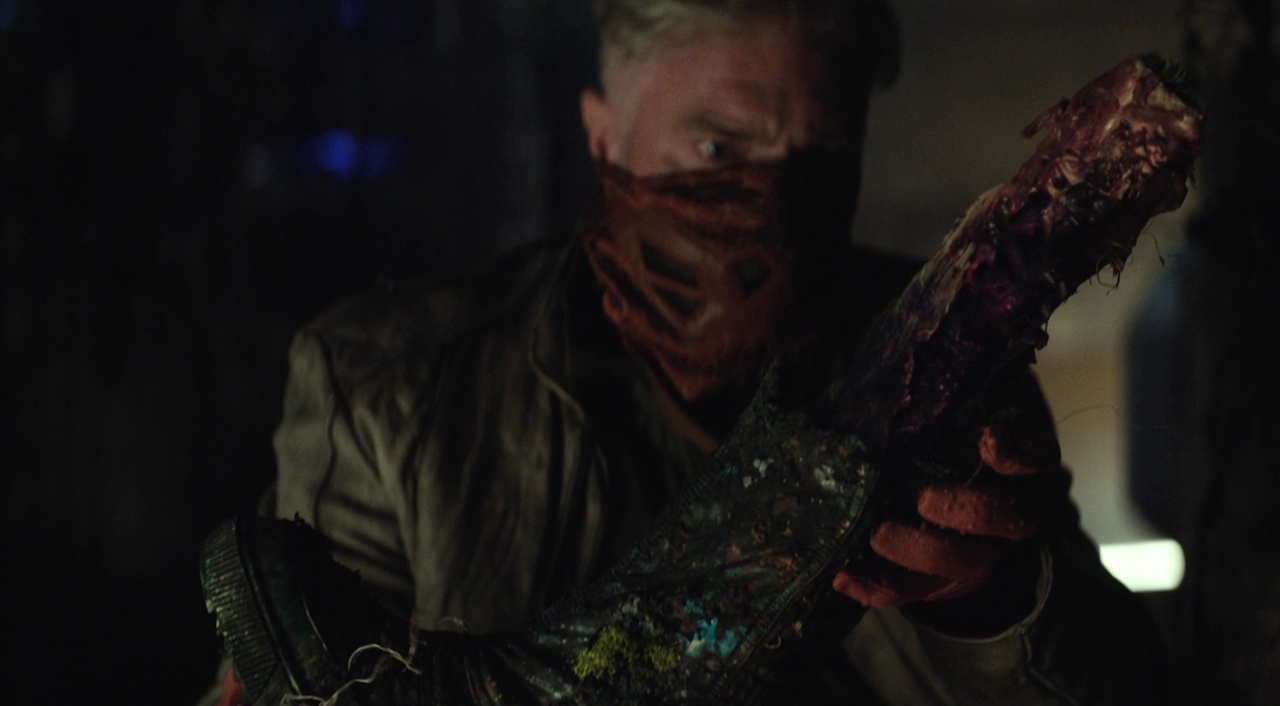 Still frame from Star Trek: Strange New Worlds 3x03: Shuttle to Kenfori, showing Pike holding a severed leg.