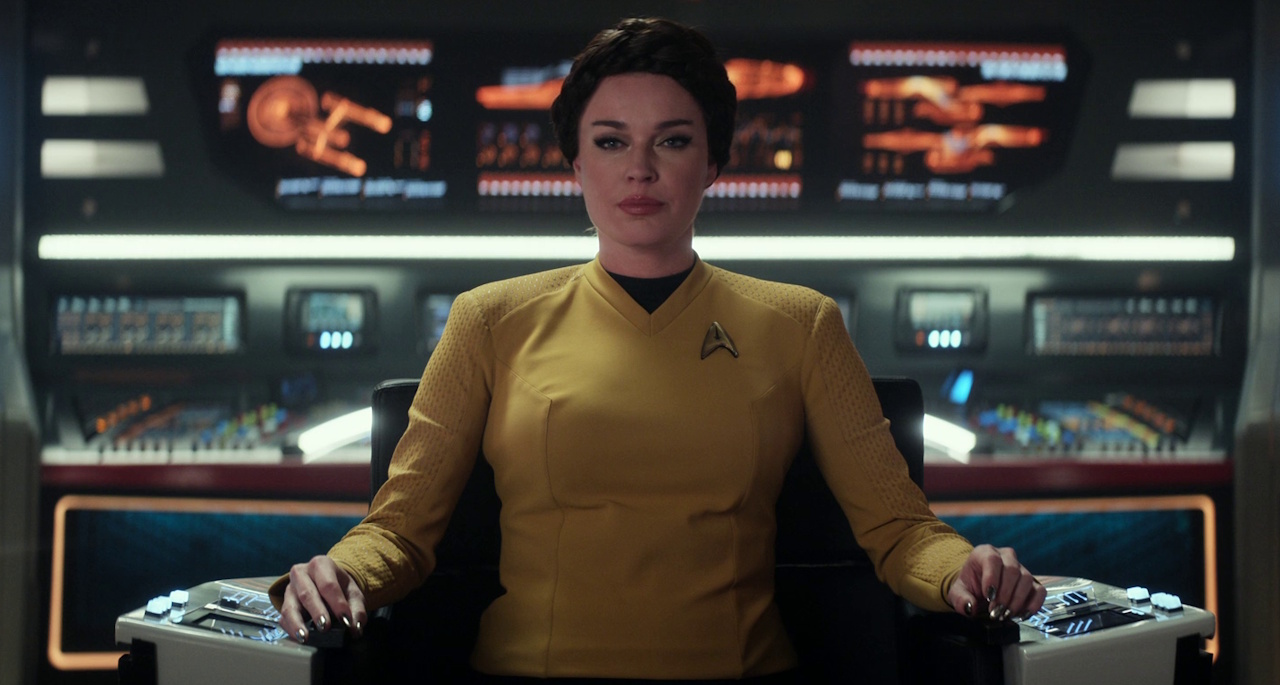 Still frame from Star Trek: Strange New Worlds 3x03: Shuttle to Kenfori, showing Una in the captain's chair.