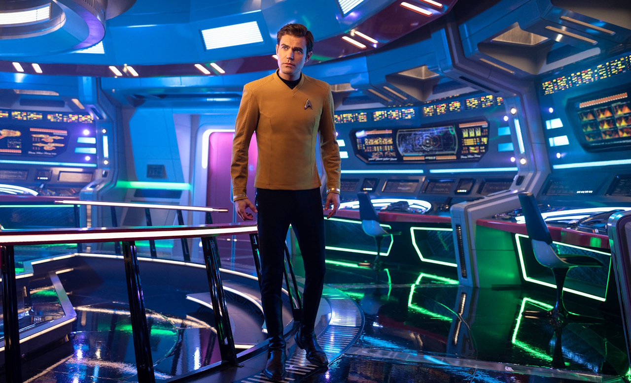 Paul Wesley as Kirk on the bridge of the Enterprise in a promotional photo.