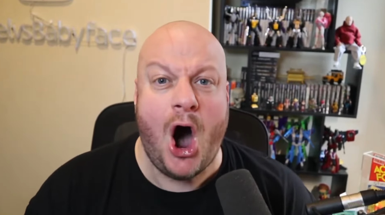 Screenshot of a famous YouTube video/meme of a commentator screaming at the camera about "pronouns" in Starfield.