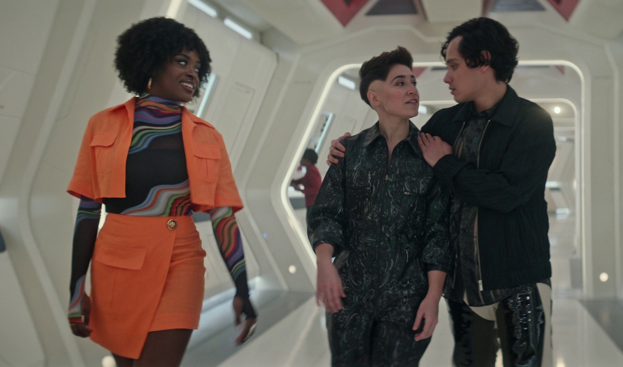 Still frame from Star Trek: Strange New Worlds 3x02 Wedding Bell Blues showing Uhura, Ortegas, and Beto in casual dress.