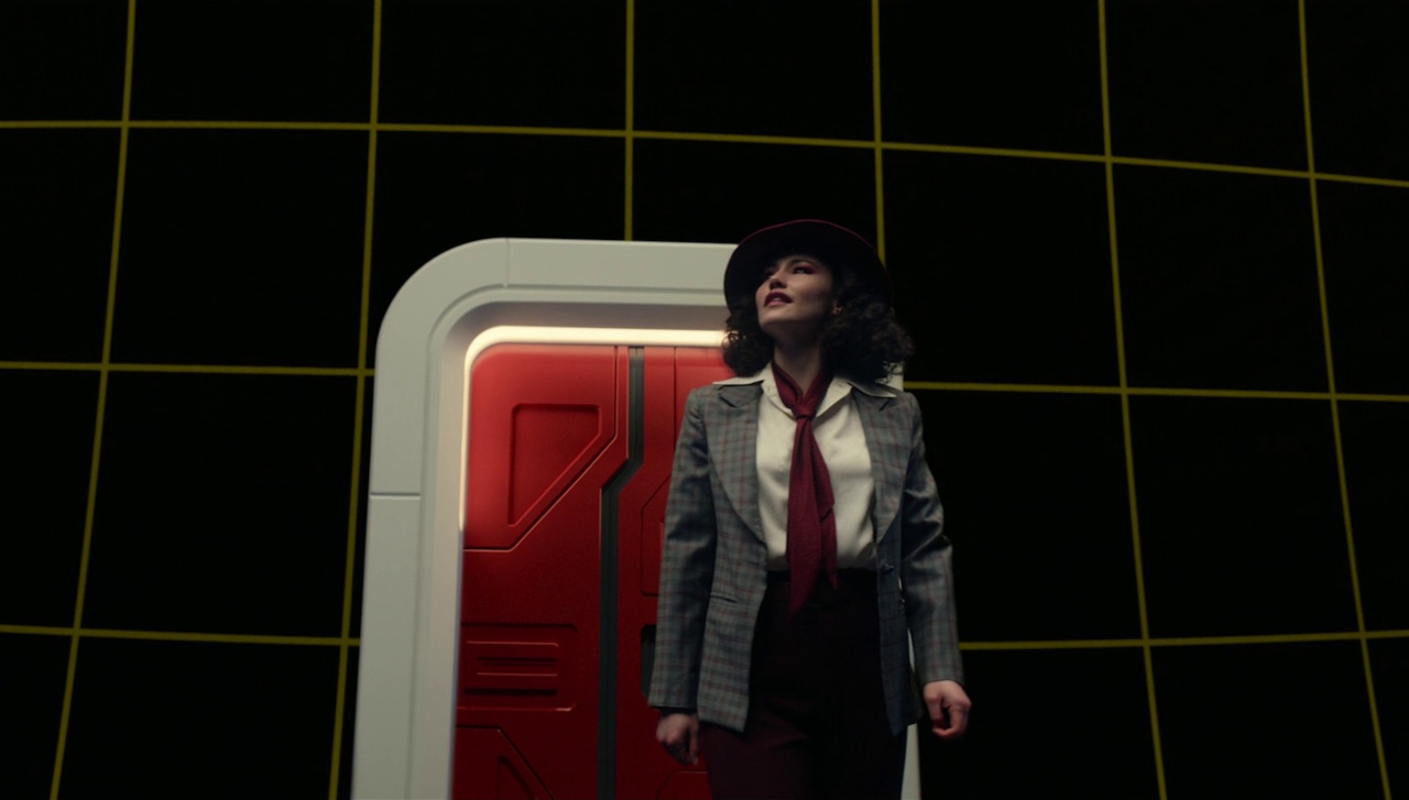 Still frame from Star Trek: Strange New Worlds showing La'an, in costume, on the holodeck.