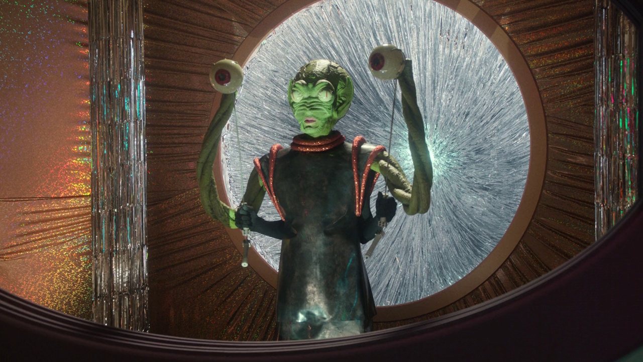 Still frame from Star Trek: Strange New Worlds 3x04 "A Space Adventure Hour," showing one of the fictional aliens.