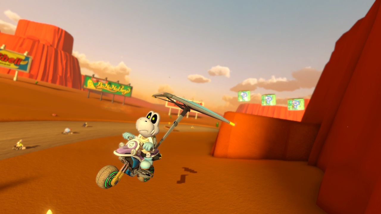 Screenshot of Mario Kart 8 Deluxe showing Dry Bones on Kalimari Desert.