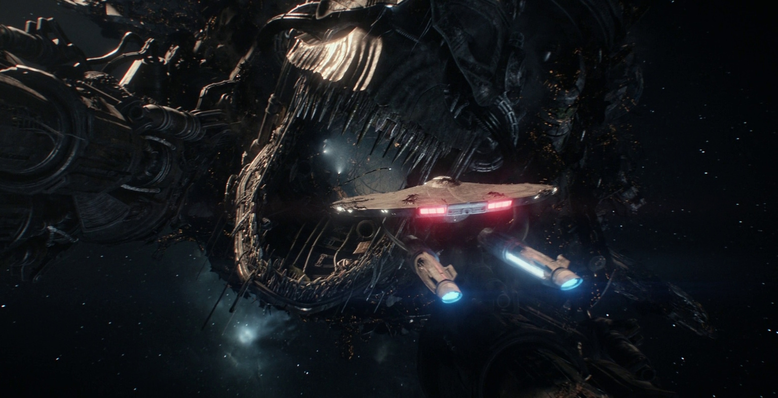 Still frame from Star Trek: Strange New Worlds 3x06: The Sehlat Who Ate Its Tail showing the Farragut and the scavengers' ship.