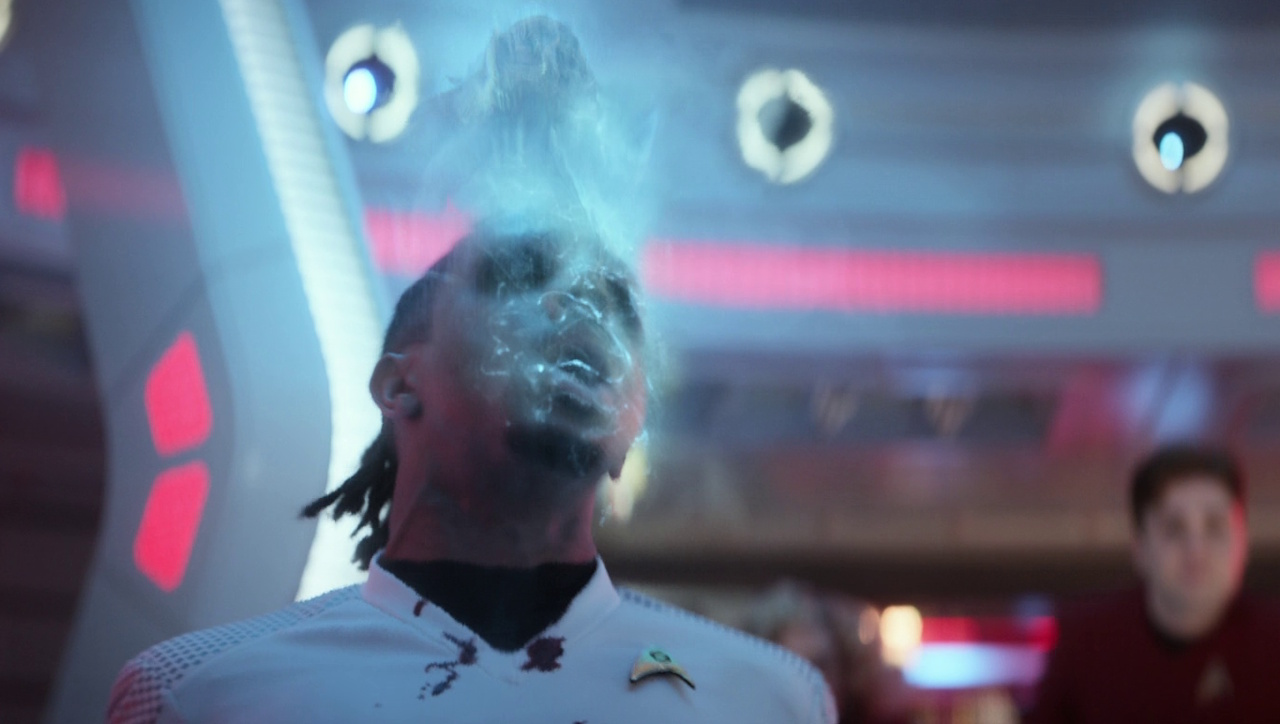 Still frame from Star Trek: Strange New Worlds 3x05 "Through the Lens of Time" showing the Vezda alien leaving Gamble's body.