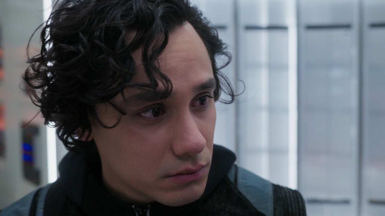 Still frame from Star Trek: Strange New Worlds S03E07 "What Is Starfleet?" showing a close-up of Beto, looking emotional.