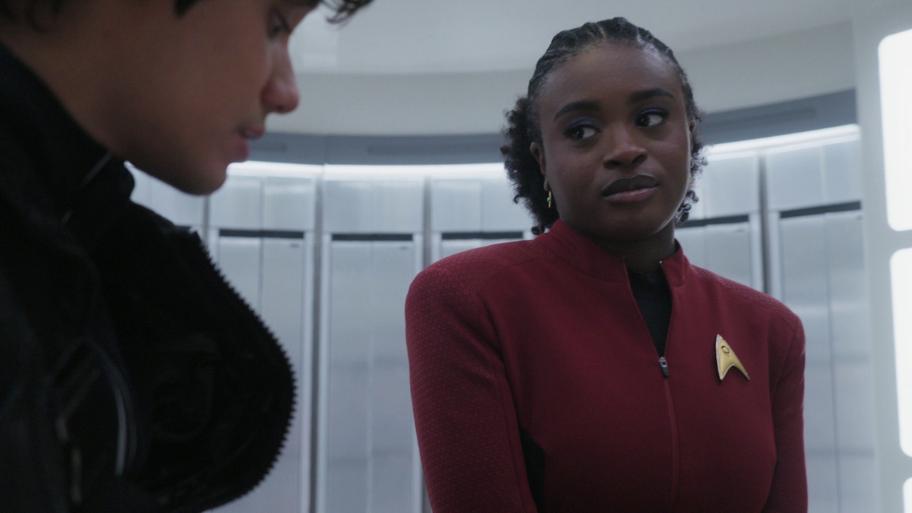 Still frame from Star Trek: Strange New Worlds S03E07 "What Is Starfleet?" showing Beto and Uhura.