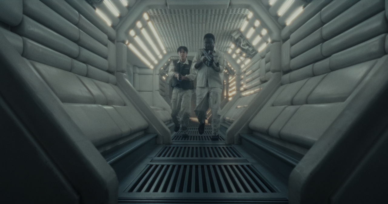 Still frame from Alien: Earth (2025) showing Morrow and his assistant aboard the Maginot.