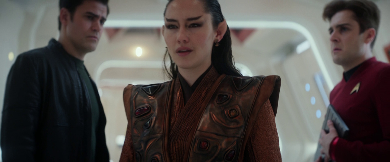 Still frame from Star Trek: Strange New Worlds, 3x08, Four-and-a-Half Vulcans showing Kirk, La'an, and Scotty.